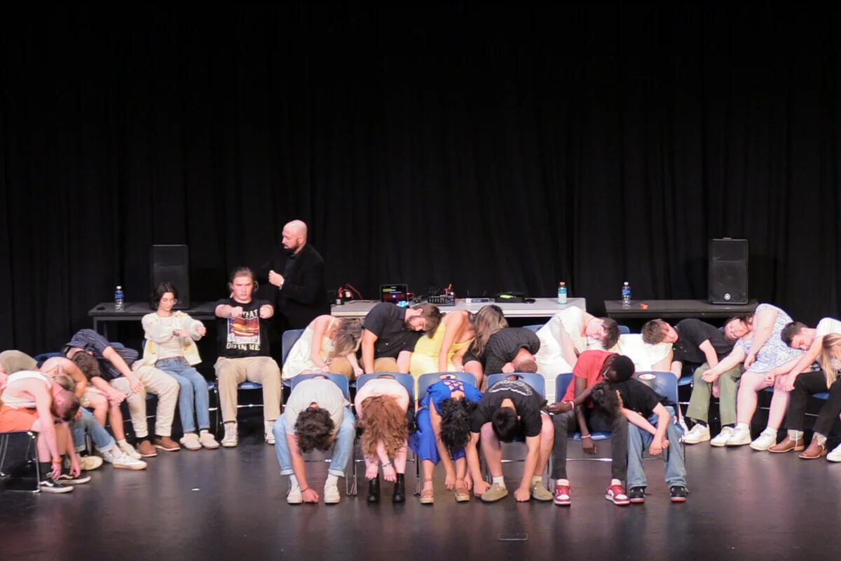 Justin James performing at a high school grad night